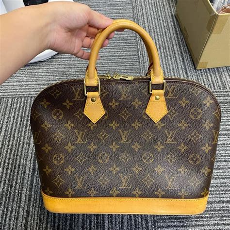 louis vuitton alma pm fake vs real|false louis vuitton prints.